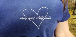A close-up of the heart design for the "Wholly loving, wholly lovable" t-shirt.